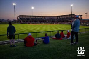 Nebraska Cornhuskers fans sticking it out to the end between the Nebraska Cornhuskers and the Kansas Jayhawks during a college baseball game Tuesday, April 22, 2025 in Lincoln, Nebraska. Photo by John S. Peterson.