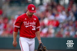 Nebraska Cornhusker pitcher Tucker Timmerman (32) walks to the dugout against the Kansas Jayhawks during a college baseball game Tuesday, April 22, 2025 in Lincoln, Nebraska. Photo by John S. Peterson.
