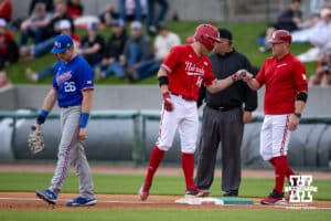 Nebraska Cornhusker utility Case Sanderson (14) hits a single against the Kansas Jayhawks during a college baseball game Tuesday, April 22, 2025 in Lincoln, Nebraska. Photo by John S. Peterson.