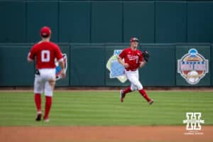Nebraska Cornhusker Max Buettenback (11) makes an out against the Kansas Jayhawks during a college baseball game Tuesday, April 22, 2025 in Lincoln, Nebraska. Photo by John S. Peterson.