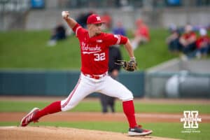 Nebraska Cornhusker pitcher Tucker Timmerman (32) throws a pitch against the Kansas Jayhawks in the first inning during a college baseball game Tuesday, April 22, 2025 in Lincoln, Nebraska. Photo by John S. Peterson.