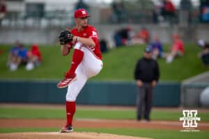 Nebraska Cornhusker pitcher Tucker Timmerman (32) throws a pitch against the Kansas Jayhawks in the first inning during a college baseball game Tuesday, April 22, 2025 in Lincoln, Nebraska. Photo by John S. Peterson.