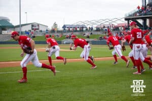 Nebraska Cornhuskers take the field to take on the Kansas Jayhawks during a college baseball game Tuesday, April 22, 2025 in Lincoln, Nebraska. Photo by John S. Peterson.