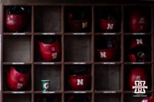 Nebraska Cornhuskers batting helmets stored away against the Kansas Jayhawks during a college baseball game Tuesday, April 22, 2025 in Lincoln, Nebraska. Photo by John S. Peterson.