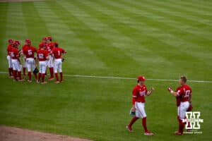 Nebraska Cornhuskers warm-up to take on the Kansas Jayhawks during a college baseball game Tuesday, April 22, 2025 in Lincoln, Nebraska. Photo by John S. Peterson.