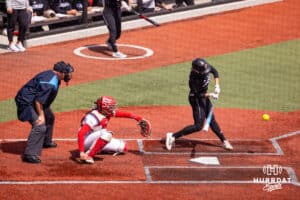 Omaha Maverick Katherine Johnson (12) hits a double against South Dakota Saturday, April 19, 2025 in Omaha, Nebraska. Photo by Braden Cochran.