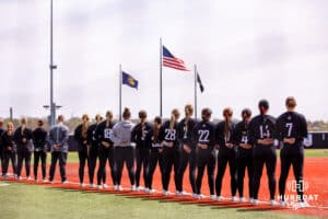 Omaha softball during the National Anthem Saturday, April 19, 2025 in Omaha, Nebraska. Photo by Braden Cochran.