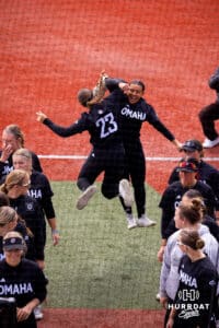 Ava Rongish (23) jumps up with Gabby Salazar during introductions Saturday, April 19, 2025 in Omaha, Nebraska. Photo by Braden Cochran.