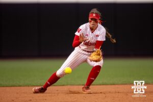 Nebraska Cornhusker Ava Kuszak (7) fields the ball against the Indiana Hoosiers during a college softball game Friday, April 18, 2025 in Omaha, Nebraska. Photo by John S. Peterson.