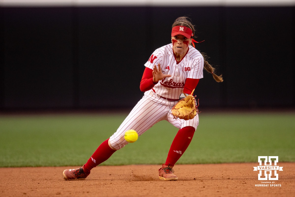 Nebraska Cornhusker Ava Kuszak (7) fields the ball against the Indiana Hoosiers during a college softball game Friday, April 18, 2025 in Omaha, Nebraska. Photo by John S. Peterson.