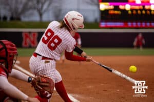 Nebraska Cornhusker Jordyn Bahl (98) gets a base hit against the Indiana Hoosiers during a college softball game Friday, April 18, 2025 in Omaha, Nebraska. Photo by John S. Peterson.