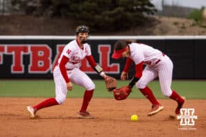 Nebraska Cornhusker Lauren Camenzind (2) fumbles the ball against the Indiana Hoosiers during a college softball game Friday, April 18, 2025 in Omaha, Nebraska. Photo by John S. Peterson.