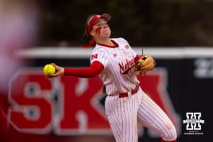 Nebraska Cornhusker Ava Kuszak (7) throws to first against the Indiana Hoosiers during a college softball game Friday, April 18, 2025 in Omaha, Nebraska. Photo by John S. Peterson.