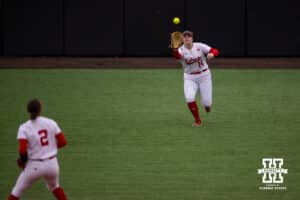 Nebraska Cornhusker Kacie Hoffmann (14) makes a catch for an out against the Indiana Hoosiers during a college softball game Friday, April 18, 2025 in Omaha, Nebraska. Photo by John S. Peterson.