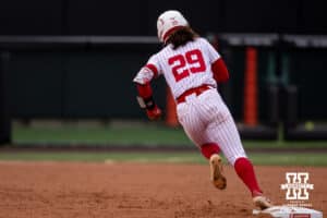 Nebraska Cornhusker Samantha Bland (29) runs to third against the Indiana Hoosiers during a college softball game Friday, April 18, 2025 in Omaha, Nebraska. Photo by John S. Peterson.