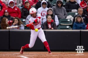 Nebraska Cornhusker Samantha Bland (29) gets a hit against the Indiana Hoosiers during a college softball game Friday, April 18, 2025 in Omaha, Nebraska. Photo by John S. Peterson.