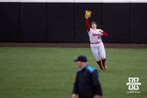 Nebraska Cornhusker Kacie Hoffmann (14) makes a catch for an out against the Indiana Hoosiers during a college softball game Friday, April 18, 2025 in Omaha, Nebraska. Photo by John S. Peterson.