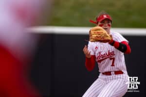 Nebraska Cornhusker Ava Kuszak (7) throws the ball to first against the Indiana Hoosiers during a college softball game Friday, April 18, 2025 in Omaha, Nebraska. Photo by John S. Peterson.