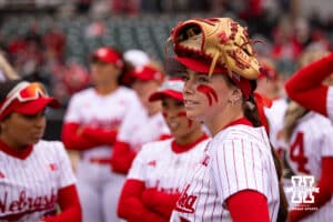 Nebraska Cornhusker Ava Kuszak (7) waiting for the game to start against the Indiana Hoosiers during a college softball game Friday, April 18, 2025 in Omaha, Nebraska. Photo by John S. Peterson.