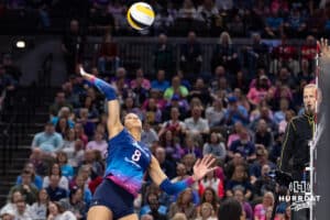 Omaha Supernovas Reagan Cooper (8) spikes the ball against the Atlanta Vibe in the first set during a professional volleyball match Saturday, April 19, 2025 in Omaha, Nebraska. Photo by John S. Peterson.