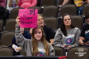 Omaha Supernovas holding a sign supporting Ally Batenhorst (14) against the Atlanta Vibe during a professional volleyball match Saturday, April 19, 2025 in Omaha, Nebraska. Photo by John S. Peterson.