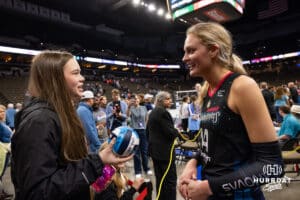 Omaha Supernova Ally Batenhorst (14) talks to a young fan from New York after the match against Grand Rapid Rise during the professional volleyball match Thursday, April 17, 2025 in Omaha, Nebraska. Photo by John S. Peterson.