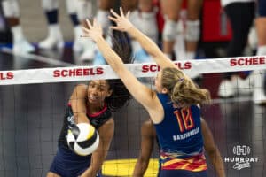 Omaha Supernova Kaitlyn Hord (23) spikes the ball against Grand Rapid Rise Ali Bastianelli (10) in the third set during the professional volleyball match Thursday, April 17, 2025 in Omaha, Nebraska. Photo by John S. Peterson.