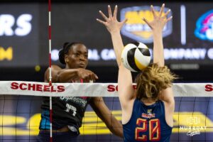 Omaha Supernova Phoebe Awoleye (17) spikes the ball against Grand Rapid Rise Eleanor Holthaus during the professional volleyball match Thursday, April 17, 2025 in Omaha, Nebraska. Photo by John S. Peterson.