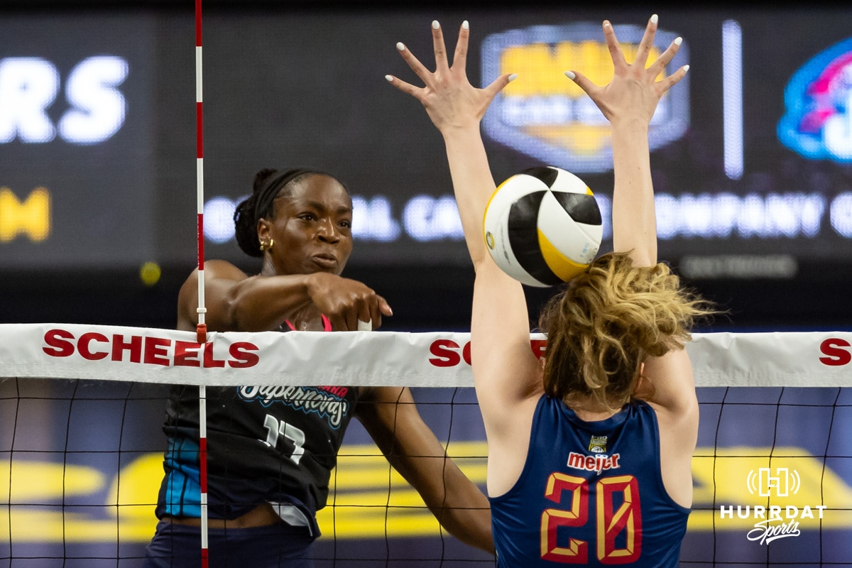 Omaha Supernova Phoebe Awoleye (17) spikes the ball against Grand Rapid Rise Eleanor Holthaus during the professional volleyball match Thursday, April 17, 2025 in Omaha, Nebraska. Photo by John S. Peterson.