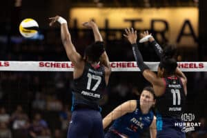 Omaha Supernova Phoebe Awoleye (17) blocks a spike against Grand Rapid Rise Paige Briggs-Romine (13) in the first set during the professional volleyball match Thursday, April 17, 2025 in Omaha, Nebraska. Photo by John S. Peterson.