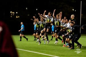 Union Omaha celebrates with a team jump during a soccer game at Caniglia Field on Tuesday, April 15, 2025, in Omaha, Nebraska. Photo by Collin Stilen.