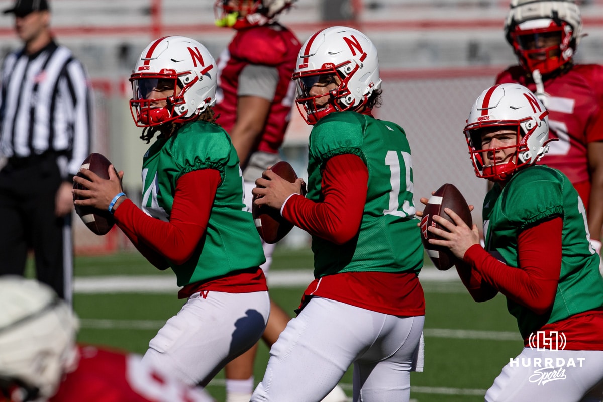 Nebraska Cornhusker quarterbacks TJ Lateef, Dylan Railola, and Marcos Davila dropback to pass during practice Tuesday, April 8, 2025 in Lincoln, Nebraska. Photo by John S. Peterson.