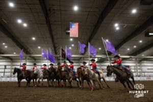 The Thundering Hooves Drill Team perform before the #13.5 Short Go Roping during the John Cook Roping Classic on Sunday, April 13, 2025 in Lincoln, Nebraska. Photo by John S. Peterson.