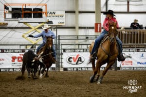 Danielle Wray the header and Jim Peterson the healer in the Invitational during the John Cook Roping Classic on Sunday, April 13, 2025 in Lincoln, Nebraska. Photo by John S. Peterson.