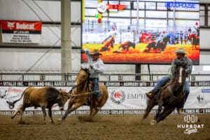 A couple of cowboys team roping during the John Cook Roping Classic on Sunday, April 13, 2025 in Lincoln, Nebraska. Photo by John S. Peterson.