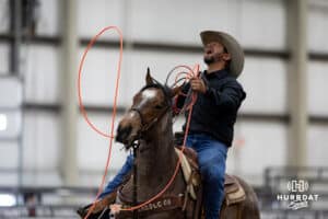 Cowboy reacts to missing the rear legs of the steer during the John Cook Roping Classic on Sunday, April 13, 2025 in Lincoln, Nebraska. Photo by John S. Peterson.
