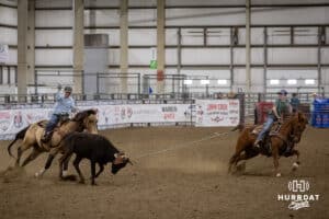 Couple of young riders team roping at the John Cook Roping Clinic on Saturday, April 12, 2025 in Lincoln, Nebraska. Photo by John S. Peterson.