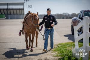 John Cook leading Reba to the arena for a day at th John Cook Roping Clinic on Saturday, April 12, 2025 in Lincoln, Nebraska. Photo by John S. Peterson.