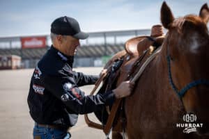 John Cook saddling up Reba for a day at the John Cook Roping Clinic on Saturday, April 12, 2025 in Lincoln, Nebraska. Photo by John S. Peterson.