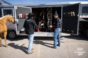 John Cook and his son Taylor prepare the horse for a day at John Cook Roping Clinic on Saturday, April 12, 2025 in Lincoln, Nebraska. Photo by John S. Peterson.