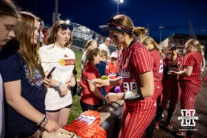 autographs after the win over the Creighton Bluejays during a college softball game Wednesday,April 4, 2025 in Lincoln, Nebraska. Photo by John S. Peterson.