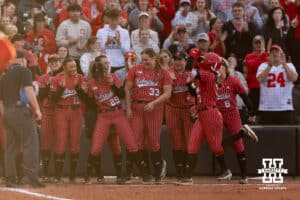 Nebraska Cornhusker Ava Kuszak (7) runs home after hitting a home run against the Creighton Bluejays in the sixth inning during a college softball game Wednesday,April 4, 2025 in Lincoln, Nebraska. Photo by John S. Peterson.