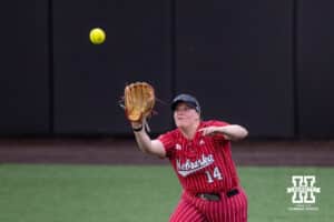 Nebraska Cornhusker Kacie Hoffmann (14) makes a catch for an out against the Creighton Bluejays in the fourth inning during a college softball game Wednesday,April 4, 2025 in Lincoln, Nebraska. Photo by John S. Peterson.