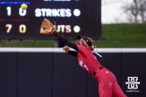 Nebraska Cornhusker Ava Kuszak (7) reaches for the ball against the Creighton Bluejays in the third inning during a college softball game Wednesday,April 4, 2025 in Lincoln, Nebraska. Photo by John S. Peterson.
