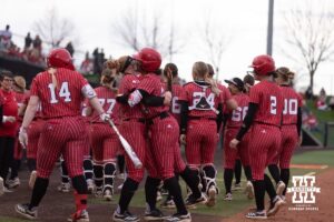 Nebraska Cornhusker Samantha Bland (29) gets hug after her home run against the Creighton Bluejays in the second inning during a college softball game Wednesday,April 4, 2025 in Lincoln, Nebraska. Photo by John S. Peterson.