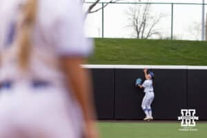 Creighton Bluejay Hannah Poole (22) tracks the ball going over the wall from Samantha Bland's home run in the second inning during a college softball game Wednesday,April 4, 2025 in Lincoln, Nebraska. Photo by John S. Peterson.