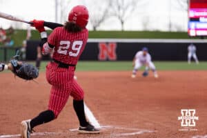 Nebraska Cornhusker Samantha Bland (29) hits a home run against the Creighton Bluejays in the second inning during a college softball game Wednesday,April 4, 2025 in Lincoln, Nebraska. Photo by John S. Peterson.