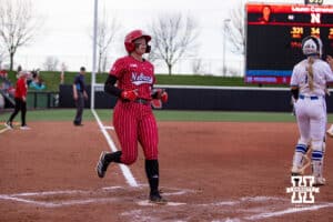 Nebraska Cornhusker Ava Kuszak (7) scores against the Creighton Bluejays in the second inning during a college softball game Wednesday,April 4, 2025 in Lincoln, Nebraska. Photo by John S. Peterson.