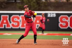 Nebraska Cornhusker Lauren Camenzind (2) throws to first for an out against the Creighton Bluejays in the first inning during a college softball game Wednesday,April 4, 2025 in Lincoln, Nebraska. Photo by John S. Peterson.