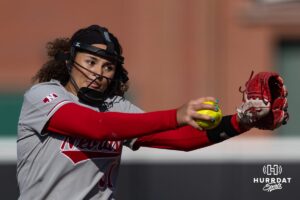 Nebraska Cornhusker Kylee Magee (31) throws a pitch against the Purdue Boilermakers in the fourth inning with a special message stitched in her glove during a college softball game Monday, March 31, 2025 in Lincoln, Nebraska. Photo by John S. Peterson.